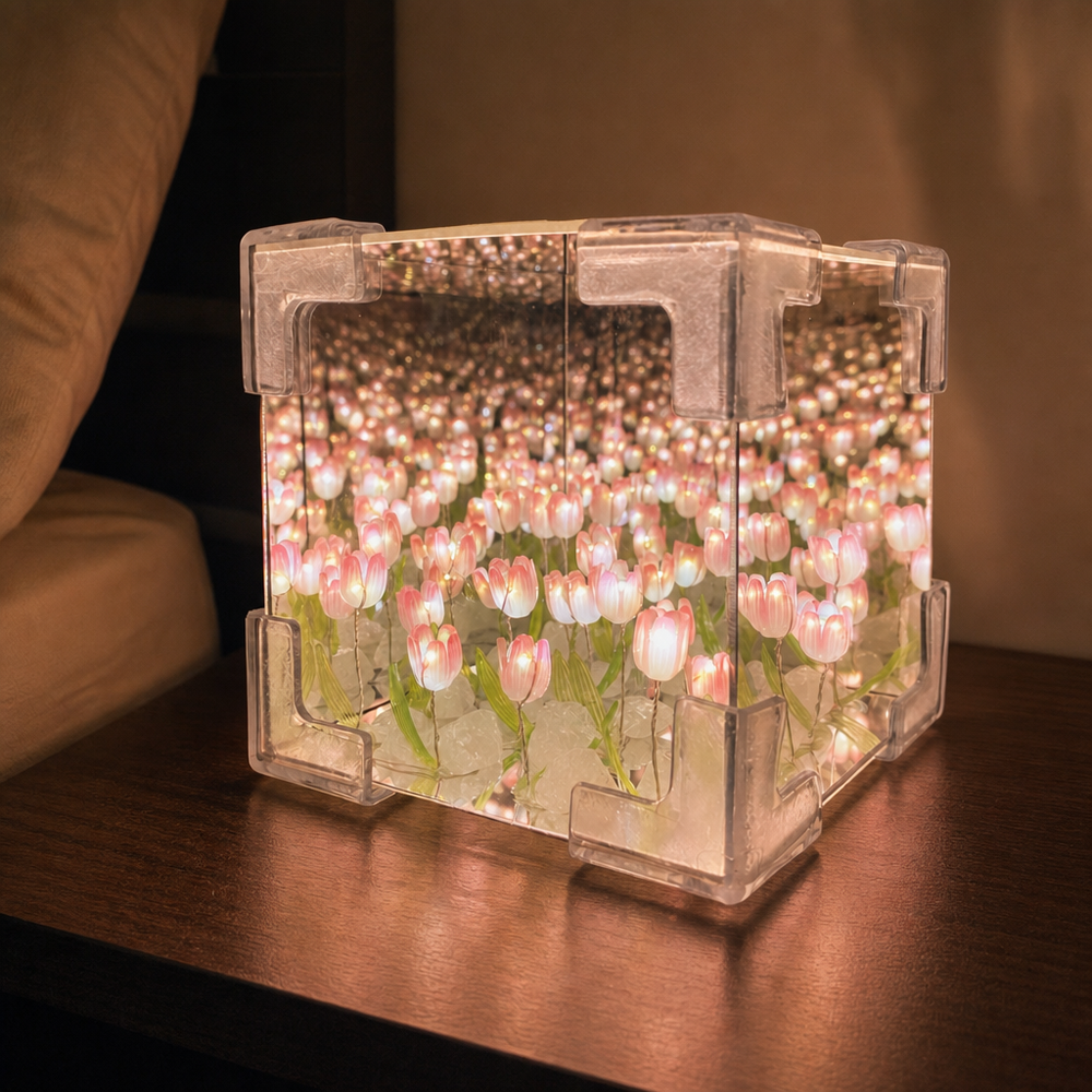 EverPetal tulip infinity lamp glowing on a bedside table